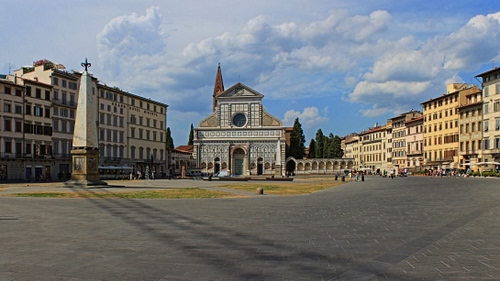 Immagine con chiesa, piazza, nuvole, obelisco, palazzi, case, croce, rosone, blu, cielo